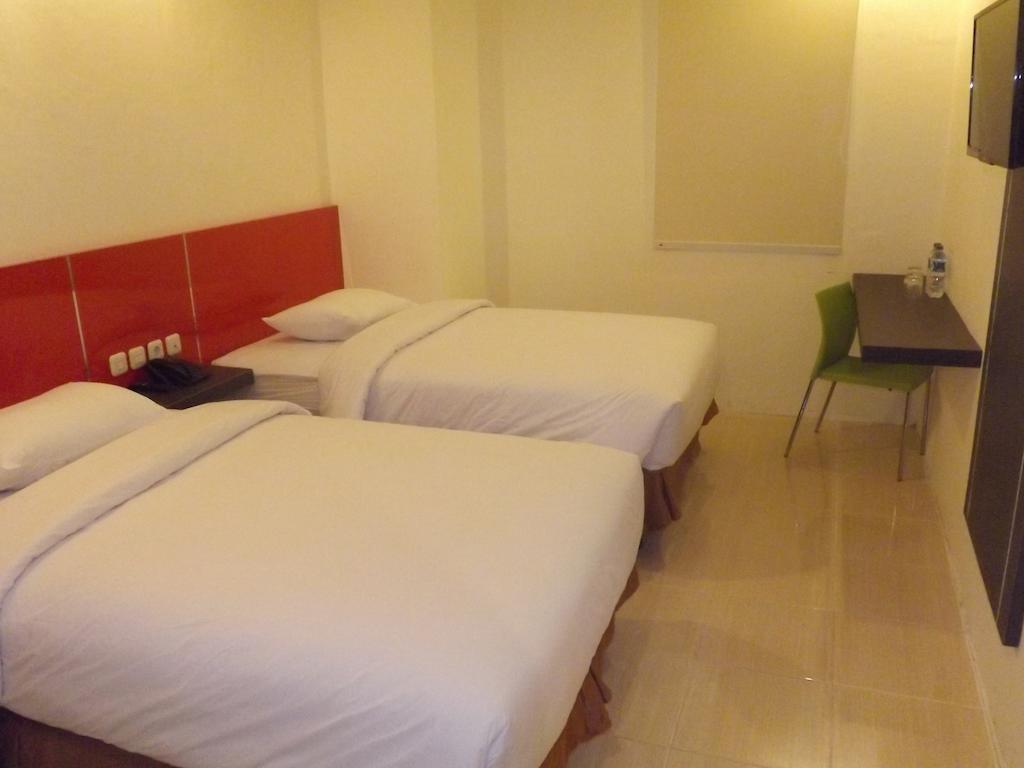 Quin Centro Hotel Palembang Exterior photo