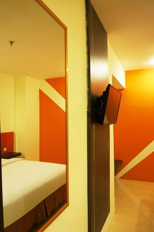 Quin Centro Hotel Palembang Room photo